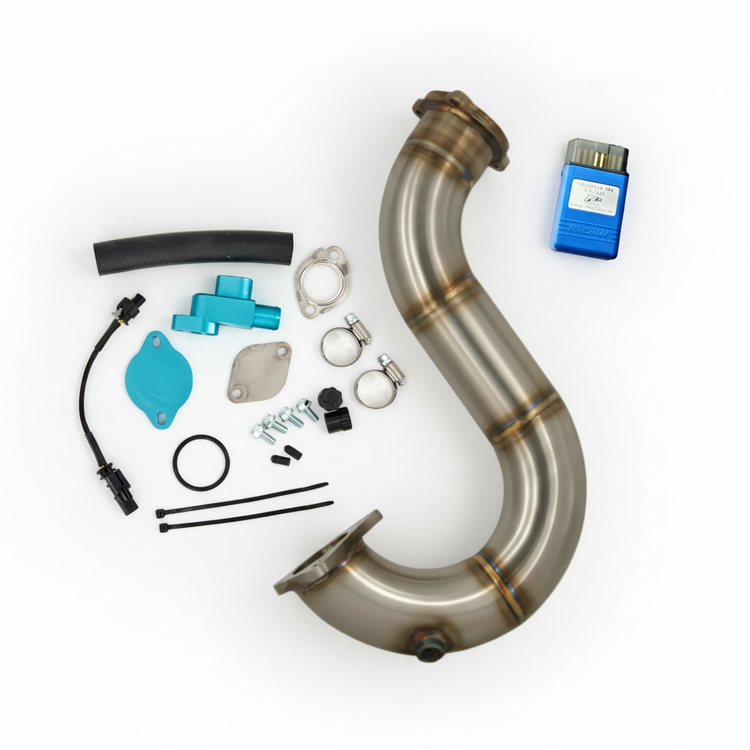 Car exhaust system kit with various components on a white background