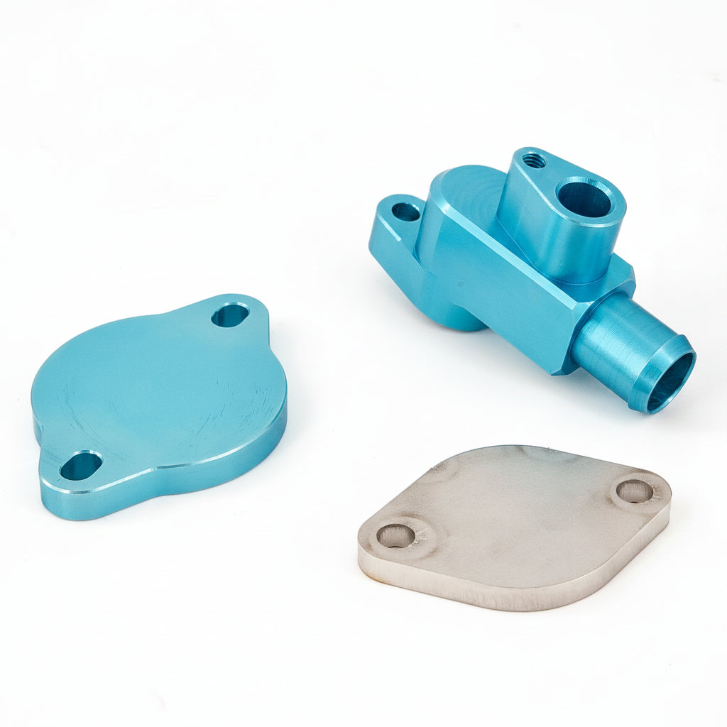 Three metal parts on a white background