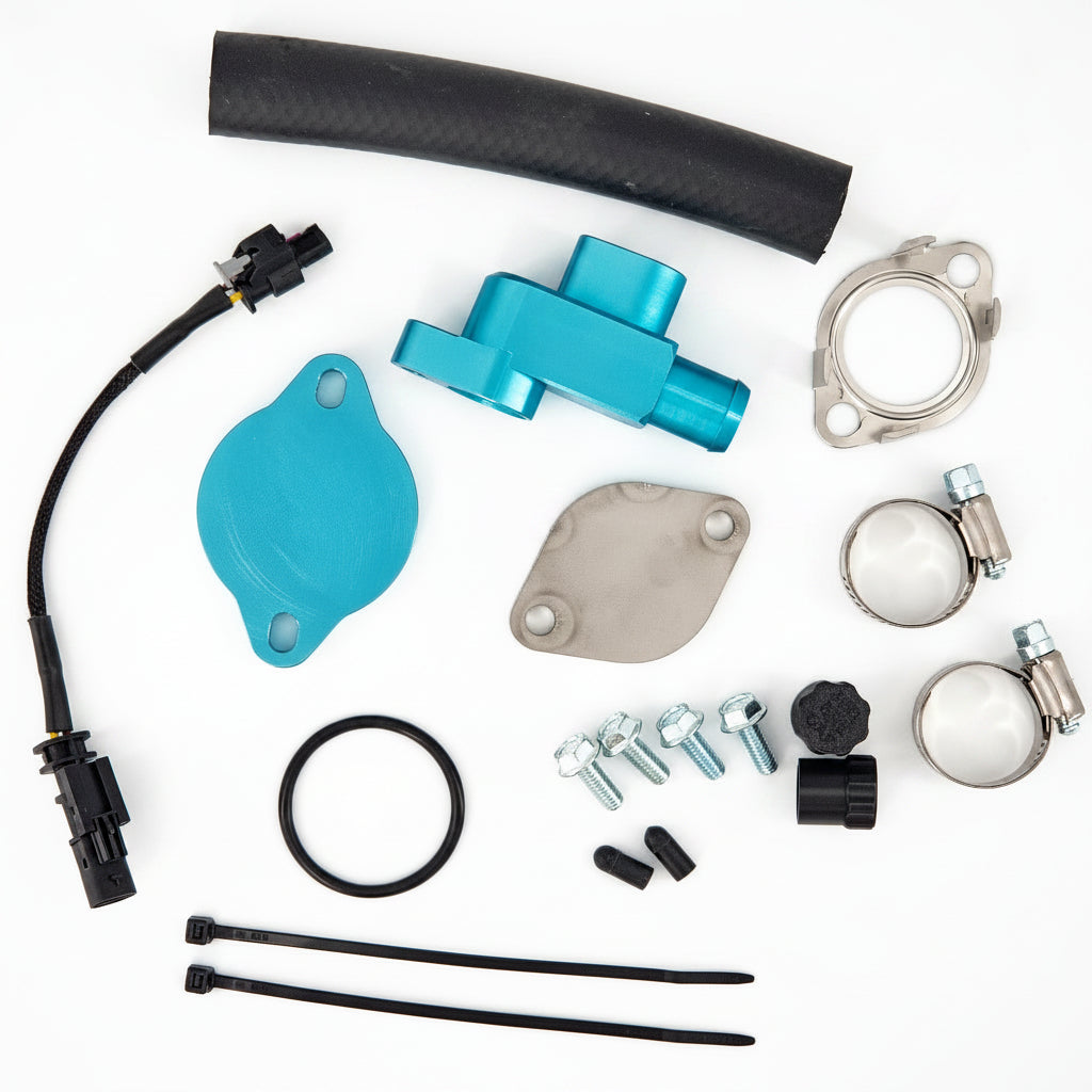 Collection of mechanical parts including a blue component, black cable, and various metal pieces on a white background
